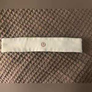 lululemon athletica mint green headband with pale pink logo